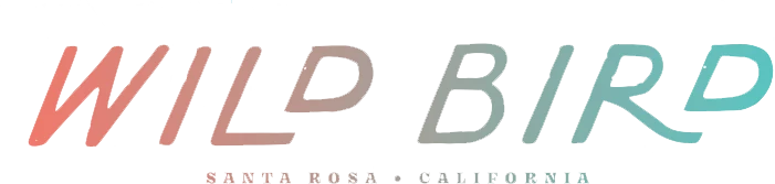 The image displays the text "WILD BIRD" with a gradient color scheme, and below it, "Santa Rosa - California" is written.